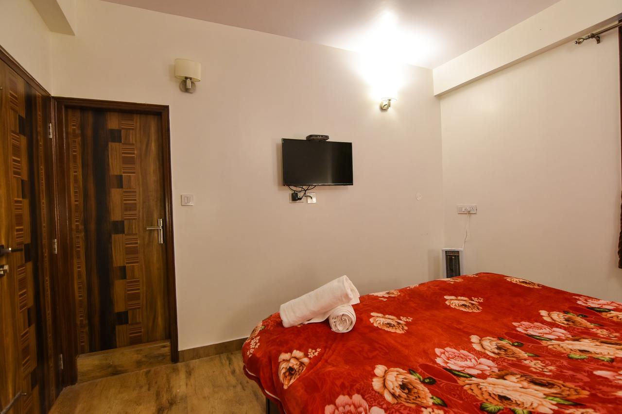 Dhanlaxmi Apartments Шимла Экстерьер фото